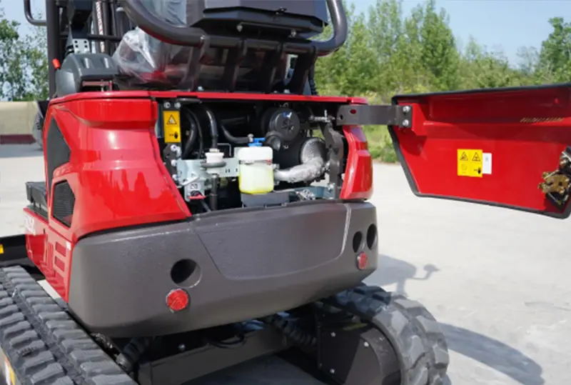 Kubota diesel engine inside a mini excavator engine bay